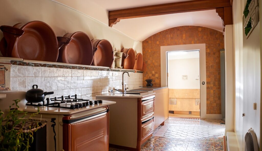 Mediterranean bliss kitchen with warm earth tones and terracotta tiles